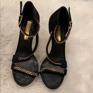 Black high heel with gold chains